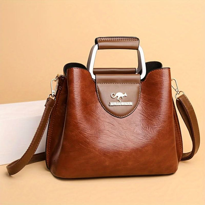 Anique - Stylish bag with spacious compartments and adjustable strap