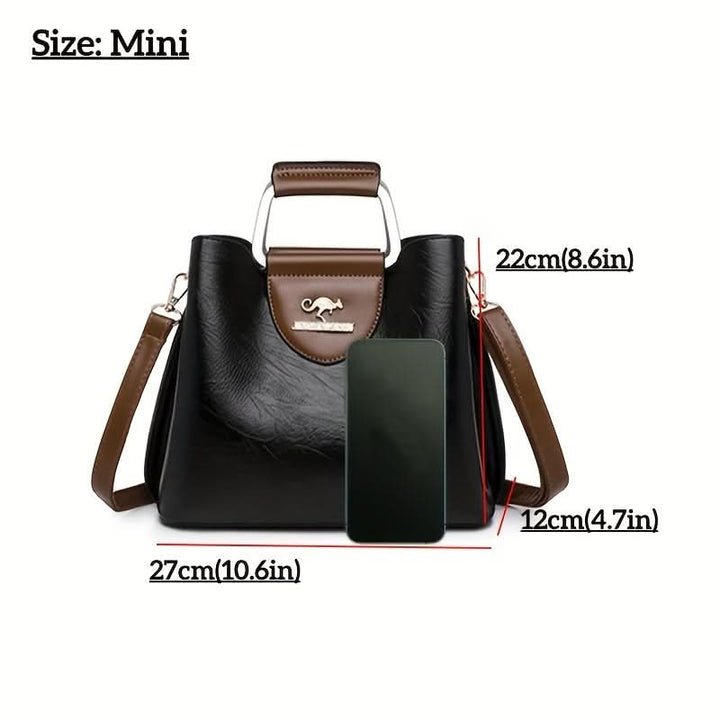 Anique - Stylish bag with spacious compartments and adjustable strap